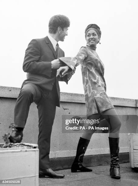 Reita Faria, the reigning Miss World, wearing one her own creations as she is pictured with Carnaby Street's Irvine Sellar at a press conference in...