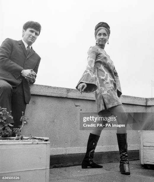 Reita Faria, the reigning Miss World, wearing one her own creations as she is pictured with Carnaby Street's Irvine Sellar at a press conference in...