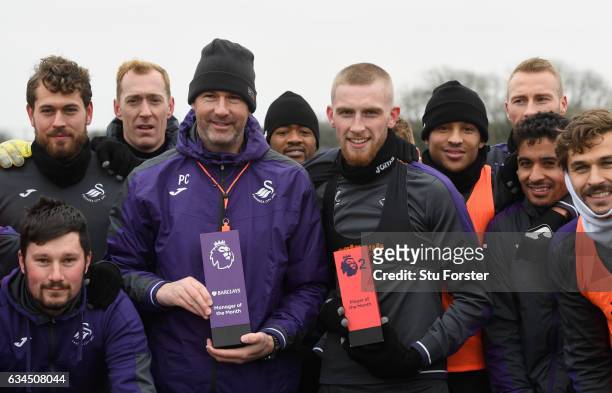Swansea City manager Paul Clement with his Barclays Manager of the Month award and player Oliver McBurnie with his Premier League 2 award with team...