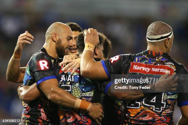 Players from the indigenous All Stars celebrate a try during the NRL All Stars match between the 2017 Harvey Norman All Stars and the NRL World All...