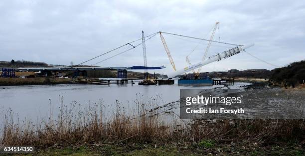 The final 100 metre centrepiece of Sunderland's new River Wear crossing is lifted into place on February 10, 2017 in Sunderland, United Kingdom. The...