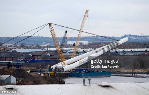 The final 100 metre centrepiece of Sunderland's new River Wear crossing is lifted into place on February 10, 2017 in Sunderland, United Kingdom. The...