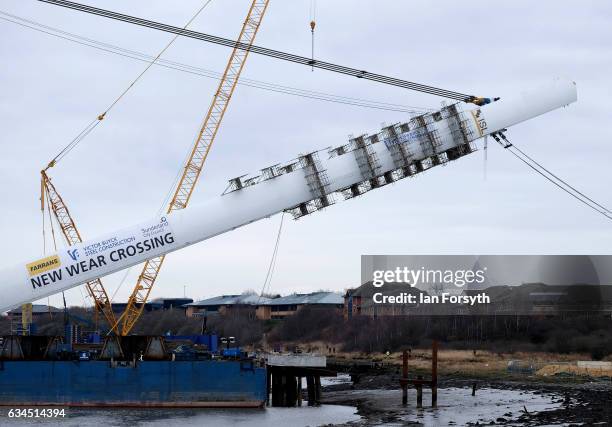 The final 100 metre centrepiece of Sunderland's new River Wear crossing is lifted into place on February 10, 2017 in Sunderland, United Kingdom. The...