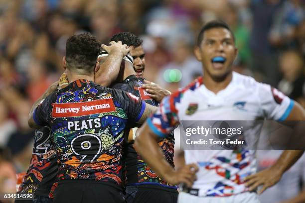 Players from the indigenous All Stars celebrate a try during the NRL All Stars match between the 2017 Harvey Norman All Stars and the NRL World All...