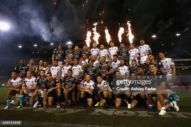 Players from both teams celebrate the end of the game during the NRL All Stars match between the 2017 Harvey Norman All Stars and the NRL World All...