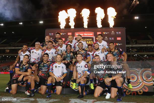 Players from both teams celebrate the end of the game during the NRL All Stars match between the 2017 Harvey Norman All Stars and the NRL World All...