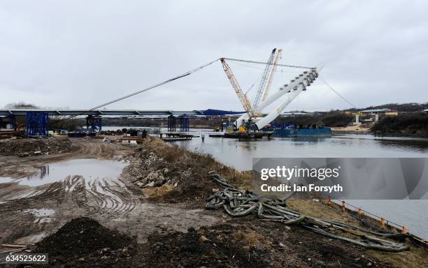 The final 100 metre centrepiece of Sunderland's new River Wear crossing is lifted into place on February 10, 2017 in Sunderland, United Kingdom. The...