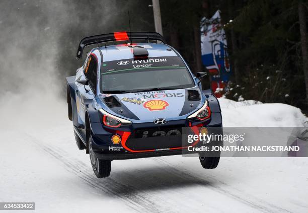 Thierry Neuville of Belgium and his co-driver Nicolas Gilsoul compete in their Hyundai i20 Coupe WRC during the 5th stage of the Rally Sweden, second...