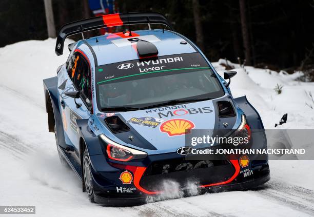 Thierry Neuville of Belgium and his co-driver Nicolas Gilsoul compete in their Hyundai i20 Coupe WRC during the 5th stage of the Rally Sweden, second...