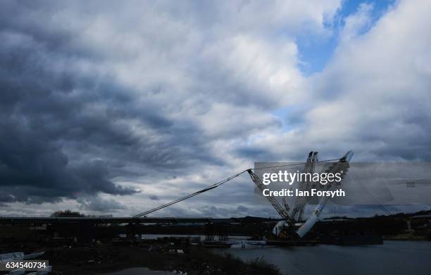 Late afternoon sunlight reflects off the final 100 metre centrepiece of Sunderland's new River Wear crossing as it is lifted into place on February...