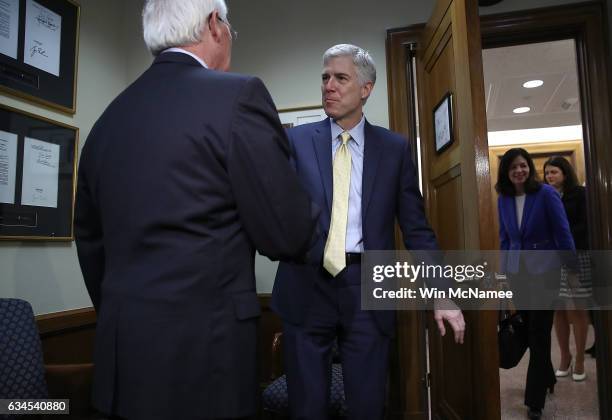 Supreme Court nominee Judge Neil Gorsuch greets Sen. Roger Wicker in Wicker's office on Capitol Hill February 10, 2017 in Washington, DC. Gorsuch...