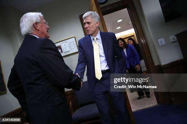 Supreme Court nominee Judge Neil Gorsuch greets Sen. Roger Wicker in Wicker's office on Capitol Hill February 10, 2017 in Washington, DC. Gorsuch...