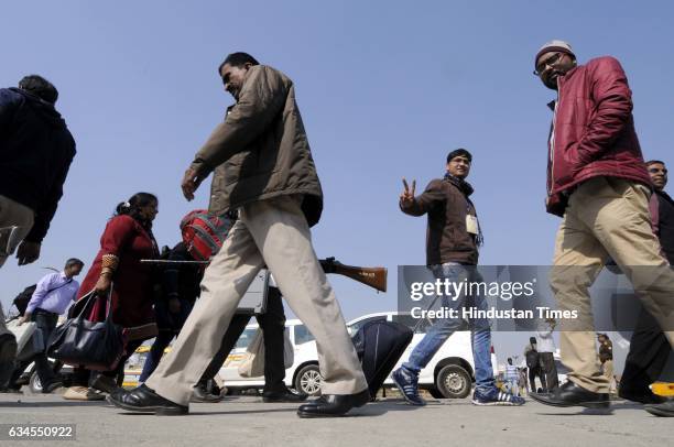 Day ahead of elections in Gautam Budh Nagar, Block Level Officers carrying EVMs to their respective booths, on February 10, 2017 in Noida, India. The...