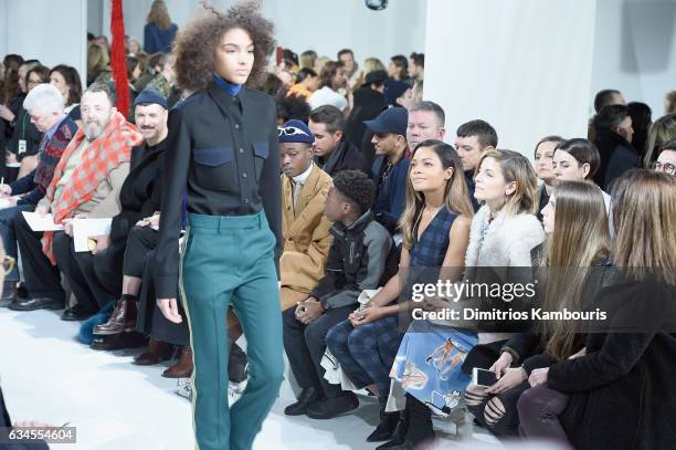 Actor Ashton Sander, Naomie Harris and Cindy Levy attend the Calvin Klein Collection Front Row during New York Fashion Week on February 10, 2017 in...