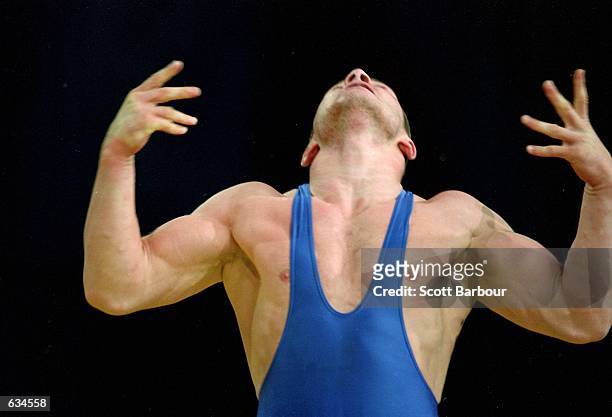 Artur Taymazov of Uzbekistan celebrates his victory over Alexis Rodriguez of Cuba after the Men's Freestyle Wrestling 69kg Event at the Sydney...