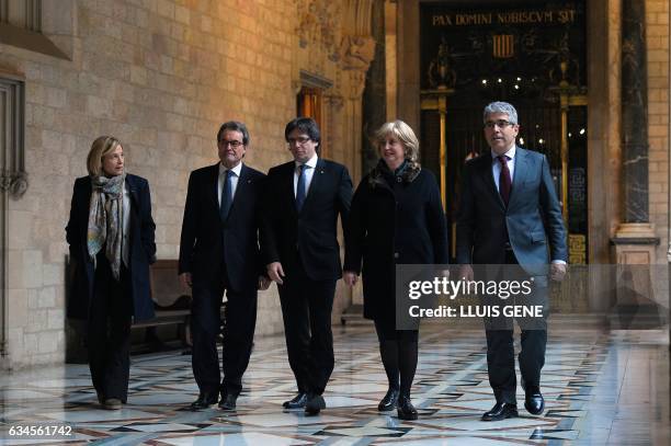 President of the Catalan Government Carles Puigdemont walks with former President of the Catalan Government and leader of Partit Democrata Europeu...