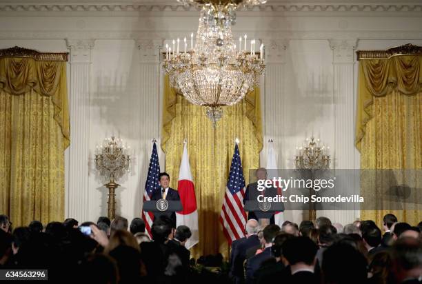 President Donald Trump holds a joint press conference with Japan Prime Minister Shinzo Abe in the East Room at the White House on February 10, 2017...