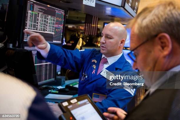 Trader works on the floor of the New York Stock Exchange in New York, U.S., on Friday, Feb. 10, 2017. U.S. Stocks advanced for the fourth time this...