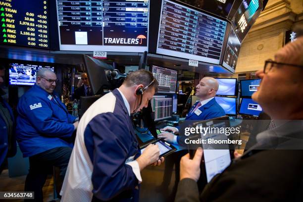 Traders work on the floor of the New York Stock Exchange in New York, U.S., on Friday, Feb. 10, 2017. U.S. Stocks advanced for the fourth time this...