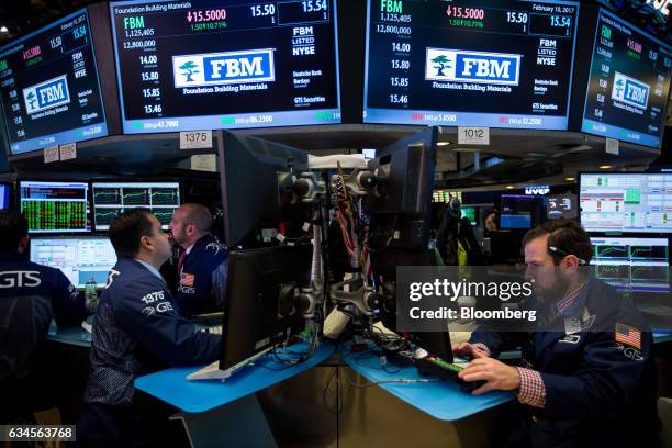 Traders work on the floor of the New York Stock Exchange in New York, U.S., on Friday, Feb. 10, 2017. U.S. Stocks advanced for the fourth time this...