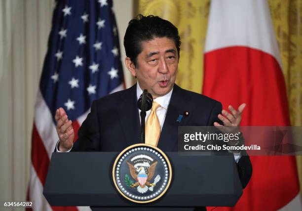 Japan Prime Minister Shinzo Abe speaks during a press conference with U.S. President Donald Trump in the East Room at the White House on February 10,...