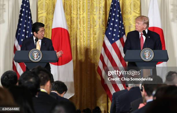 President Donald Trump holds a joint press conference with Japan Prime Minister Shinzo Abe in the East Room at the White House on February 10, 2017...