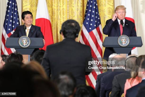 President Donald Trump holds a joint press conference with Japan Prime Minister Shinzo Abe in the East Room at the White House on February 10, 2017...