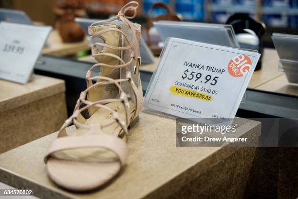 An Ivanka Trump brand women's shoe sits on the shelf at a DSW shoe store, February 10, 2017 in New York City. According to a market research firm...