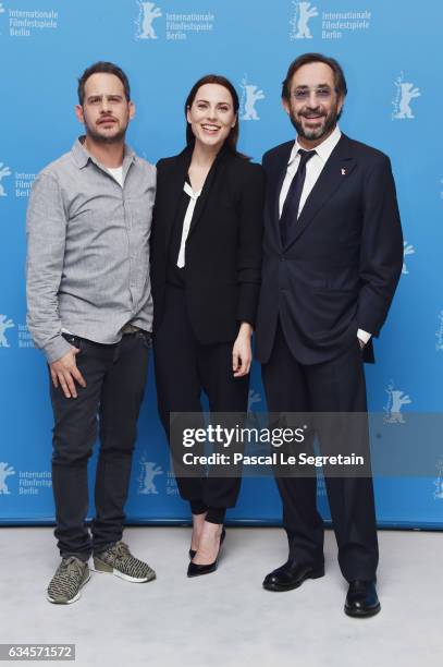 Actors Moritz Bleibtreu, Antje Traue and director Sam Garbarski attend the 'Bye Bye Germany' photo call during the 67th Berlinale International Film...