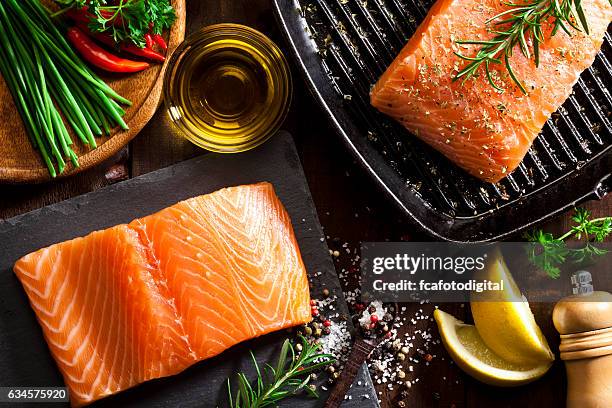 raw salmon steak - salmon steak stock pictures, royalty-free photos & images