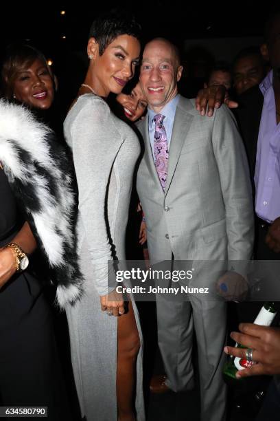 Nicole Mitchell Murphy and Ted Reid attend the Annual Pre-Grammy Reception hosted by Ted Reid at STK on February 9, 2017 in Los Angeles, California.