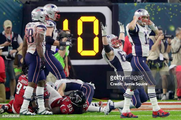 Tom Brady of the New England Patriots reacts after defeating the Atlanta Falcons 34-28 in overtime to win Super Bowl 51 at NRG Stadium on February 5,...