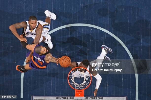 Tyson Chandler of the Phoenix Suns and James Ennis of the Memphis Grizzlies go up for a rebound on February 8, 2017 at FedExForum in Memphis,...