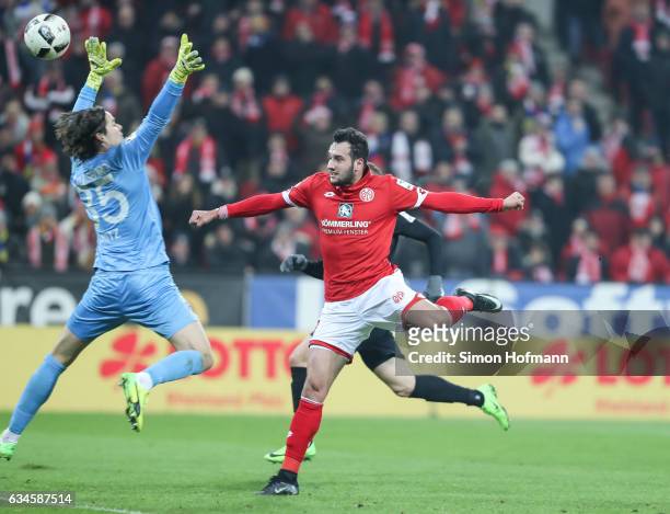 Levin Oeztunali of Mainz scores his team's first goal past Marwin Hitz of Augsburg during the Bundesliga match between 1. FSV Mainz 05 and FC...