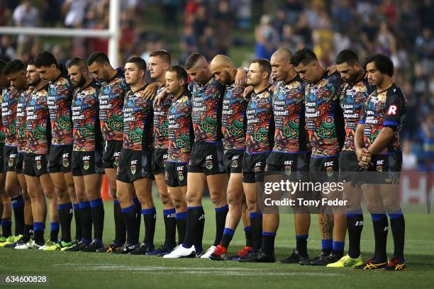 The Indigenous All stars line up for the National Anthem before the start of the game during the NRL All Stars match between the 2017 Harvey Norman...