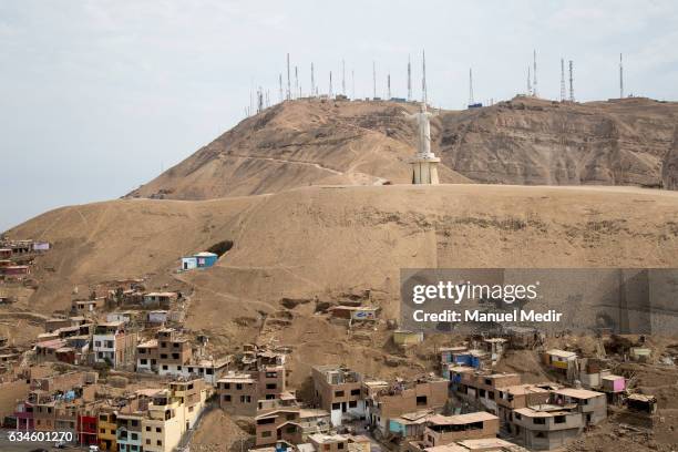 General view of Chorrillos with the Christ of the Pacific, a replica of Rio de Janeiro's Cristo Redentor donated by Odebrecht, on February 10, 2017...