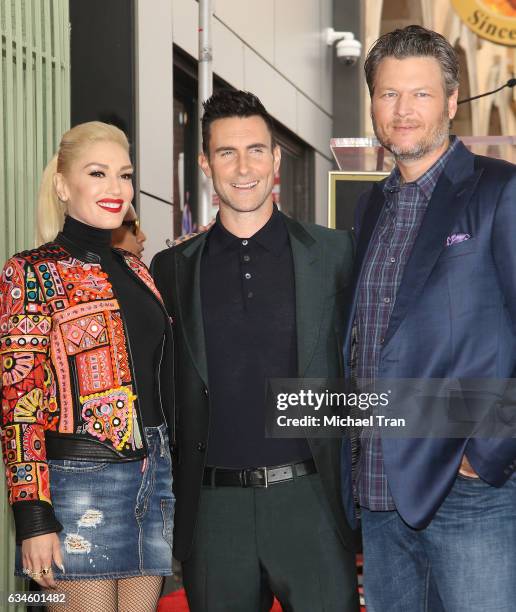 Adam Levine with Gwen Stefani and Blake Shelton attend the ceremony honoring Adam Levine with a Star on The Hollywood Walk of Fame held on February...