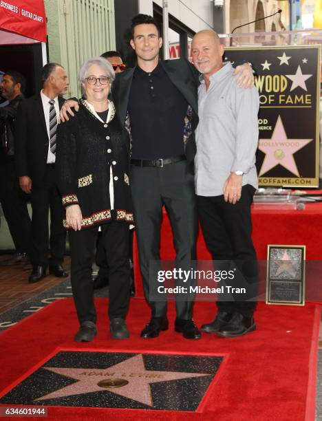 Adam Levine and his parents attend the ceremony honoring Adam Levine with a Star on The Hollywood Walk of Fame held on February 10, 2017 in...