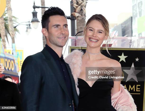 Recording artist Adam Levine and wife model Behati Prinsloo attend his being honored with a Star on the Hollywood Walk of Fame on February 10, 2017...