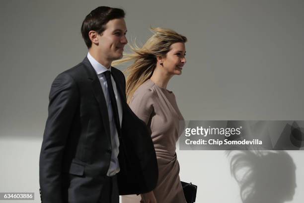 White House Senior Advisor to the President for Strategic Planning Jared Kushner and his wife and President Donald Trump's daughter Ivanka Trump walk...