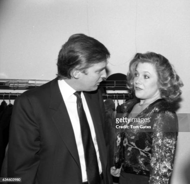 Businessman Donald Trump chats with actress Kathleen Turner at the D.W. Girffith Awards At Lincoln Center Library in February 1988 in New York, New...