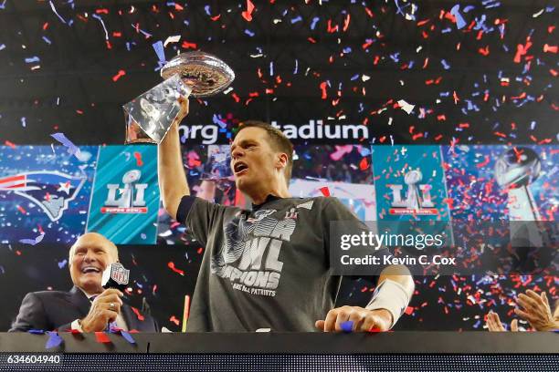 Tom Brady of the New England Patriots celebrates after the Patriots celebrates after the Patriots defeat the Atlanta Falcons 34-28 during Super Bowl...