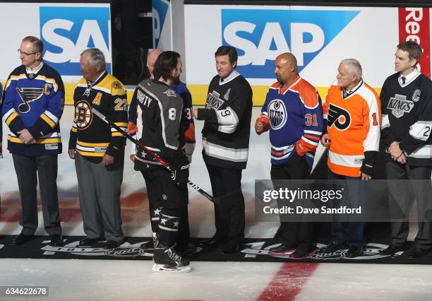 Drew Doughty of the Los Angeles Kings talks with Wayne Gretzky during pre-game ceremonies prior to the 2017 Honda NHL All-Star Game at Staples Center...