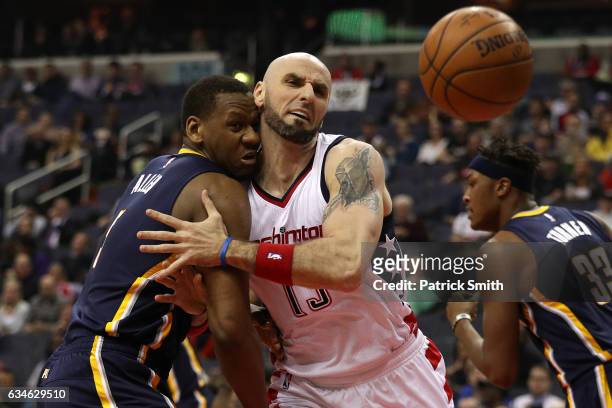 Marcin Gortat of the Washington Wizards battles Lavoy Allen of the Indiana Pacers for a rebound during the first half at Verizon Center on February...