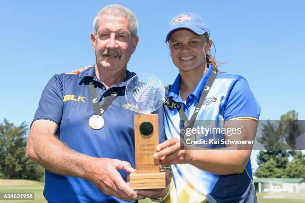 Sparks Coach Warren Lees and Suzie Bates of the Sparks pose with the trophy following the Womens Twenty20 Final match between Canterbury Magicians...