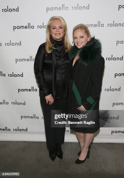 Designer Pamella Roland poses for a picture backstage with Sydney DeVos at the Pamella Roland Fashion Show during New York Fashion Week at Pier 59...
