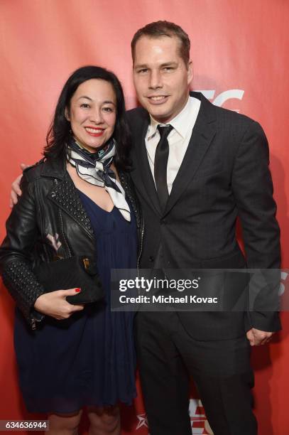 Artist Shepard Fairey and Amanda Fairey attend MusiCares Person of the Year honoring Tom Petty at the Los Angeles Convention Center on February 10,...