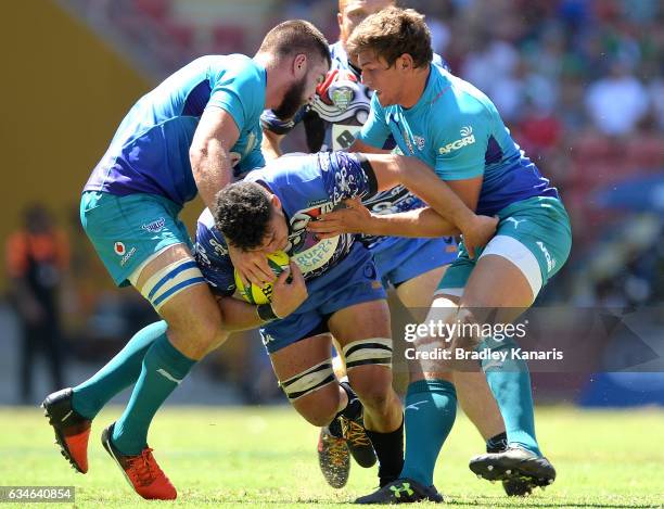 Kane Koteka of the Force takes on the defence during the Rugby Global Tens match between the Bulls and Western Force at Suncorp Stadium on February...