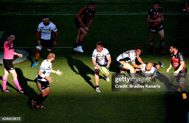 Thomas Staniforth of the Brumbies passes the ball during the Rugby Global Tens match between the Brumbies and Toulon at Suncorp Stadium on February...