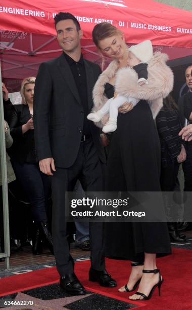 Musician Adam Levine, wife/model Behati Prinsloo and daughter Dusty Rose at his Star On The Hollywood Walk Of Fame ceremoney on February 10, 2017 in...